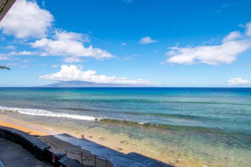 a view of the ocean from a beach at Maui Kai 504 in Kahana