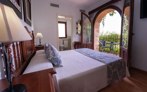 Ένα ή περισσότερα κρεβάτια σε δωμάτιο στο Casa Rural Galatea especial Grupos