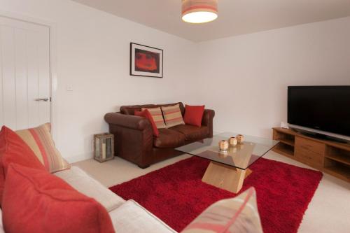 TV a/nebo společenská místnost v ubytování DBS Serviced Apartments - The Mews