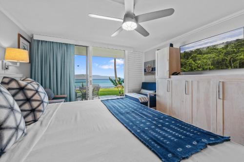 a bedroom with a bed with a ceiling fan at Napili Shores I174 in Kapalua