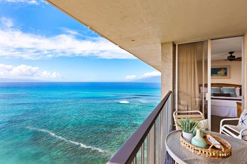 a balcony with a view of the ocean at Royal Kahana 1212 in Kahana