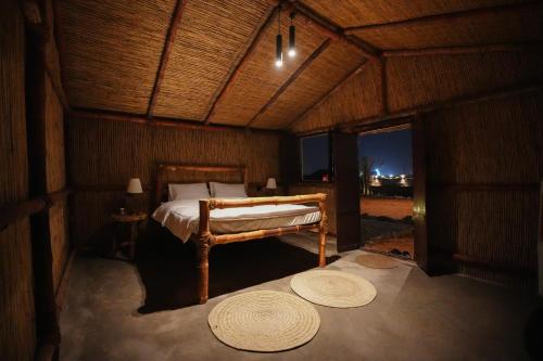 Postel nebo postele na pokoji v ubytování Al Reem Ranch