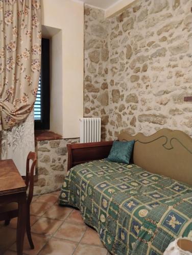 Postel nebo postele na pokoji v ubytování Il Gallo d' Oro - Oca