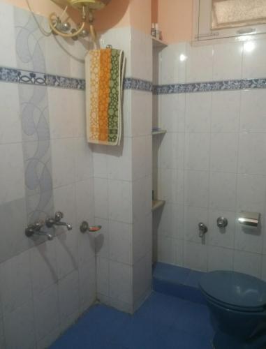 a bathroom with a shower with a toilet at Harmony Homestay Couple & Family friendly prime location Easy access to Mall Rd -City view in Solan