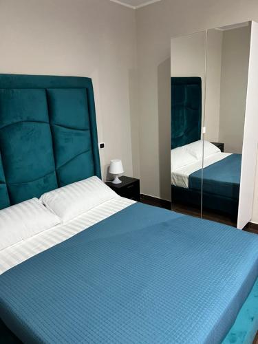 Cama o camas de una habitación en Hotel Iris