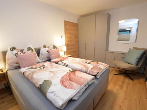 Ένα ή περισσότερα κρεβάτια σε δωμάτιο στο Bruggerheim