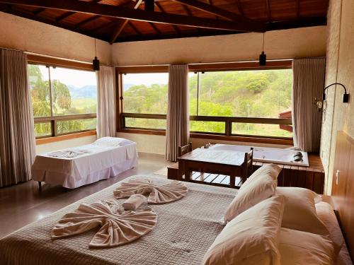 Postel nebo postele na pokoji v ubytování Pousada Fazenda do Engenho