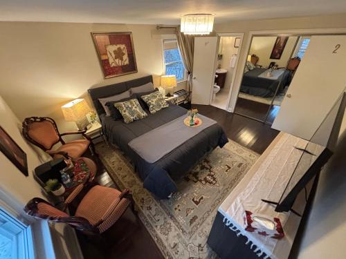 Кровать или кровати в номере Vintage Pines Guest House