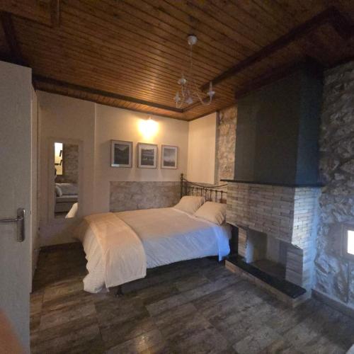 Postel nebo postele na pokoji v ubytování Κτήμα Βασίληγιάννη