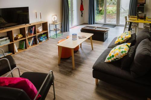 Posezení v ubytování Appartement rétro nature avec jardin 15 min Toulouse centre