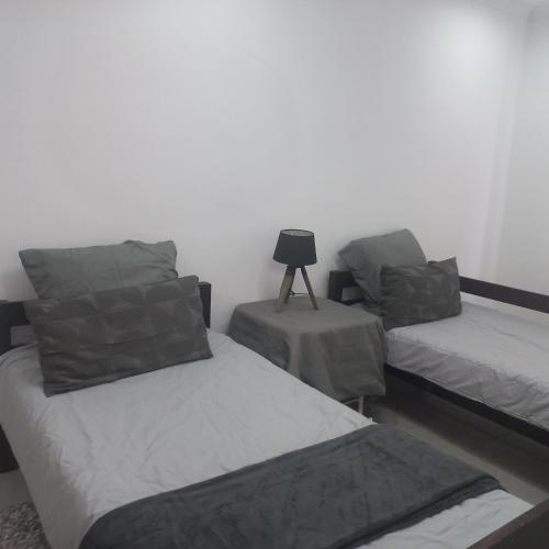 En eller flere senge i et værelse på 200 on Genazzano