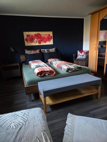 Postel nebo postele na pokoji v ubytování Ferienwohnung FeWe Wandern und Skifahren