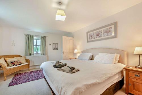 En eller flere senge i et værelse på 6 Bed in Ludchurch oc-m29751