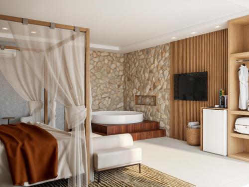 Ένα ή περισσότερα κρεβάτια σε δωμάτιο στο Villa Sol e Mar