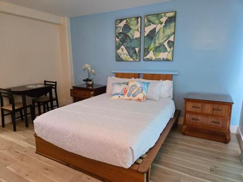 En eller flere senge i et værelse på Inn on the Park #1009