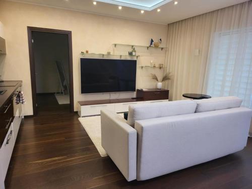 TV a/nebo společenská místnost v ubytování Seaside Forest Residence