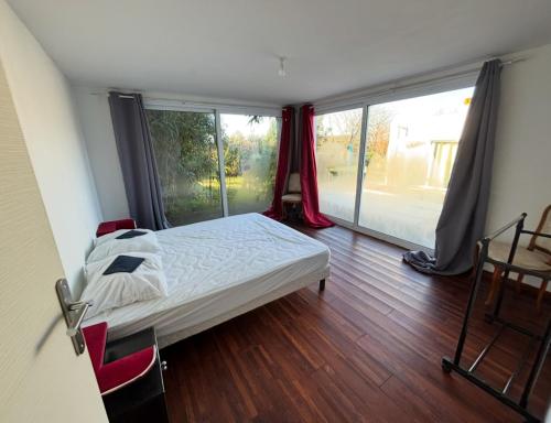 Postel nebo postele na pokoji v ubytování La Casba 15 mm plage Contis