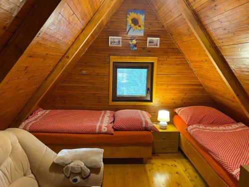 Ένα ή περισσότερα κρεβάτια σε δωμάτιο στο Chata Safran