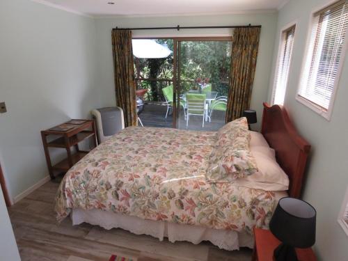 Ένα ή περισσότερα κρεβάτια σε δωμάτιο στο Cabaña San Rafael