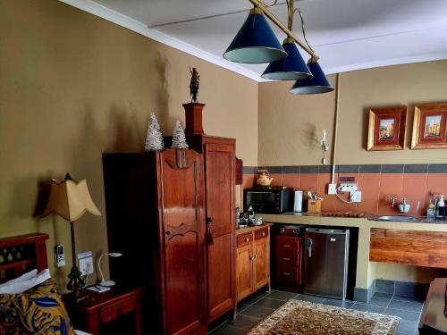 Køkken eller tekøkken på Koekeloer Selfcatering Cottages