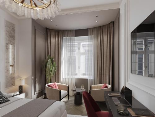 En eller flere senge i et værelse på White Gallo Residences