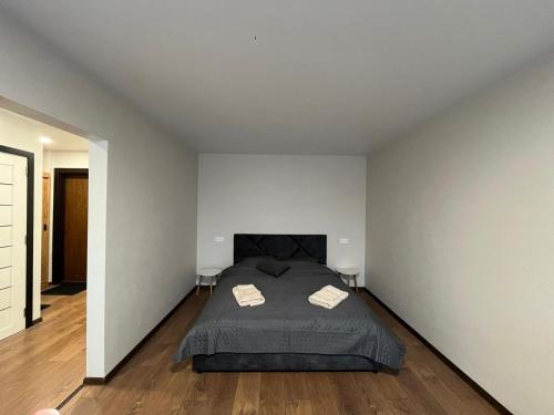 Ένα ή περισσότερα κρεβάτια σε δωμάτιο στο Stay Calm in Liepaja