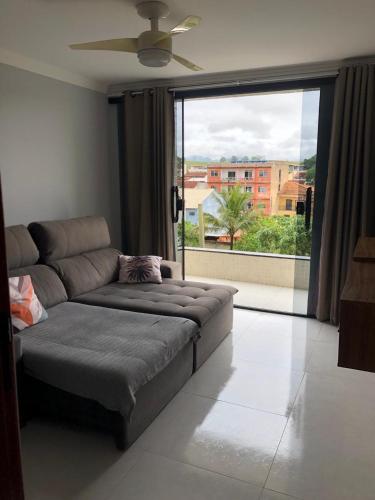 Et opholdsområde på Apartamento Piúma