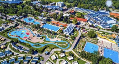an aerial view of a resort with many pools at EMIA Family House Čatež in Brežice