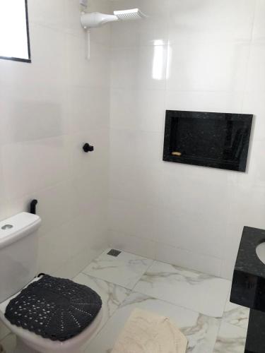 Et badeværelse på Apartamento Piúma