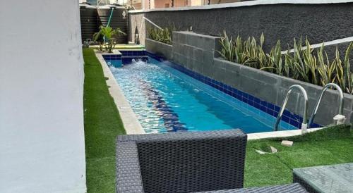 Bazén v ubytování Raj Holidays Homes nebo v jeho okolí