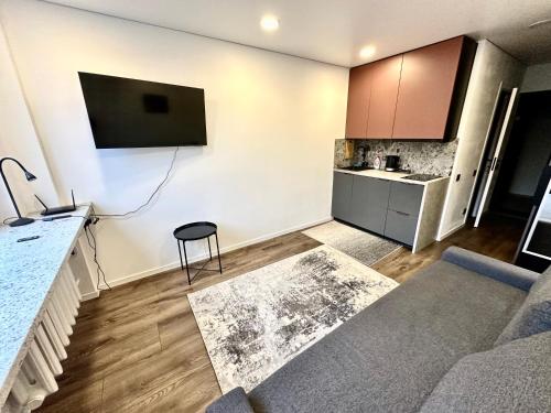 Køkken eller tekøkken på Комфортная современная студия в центре