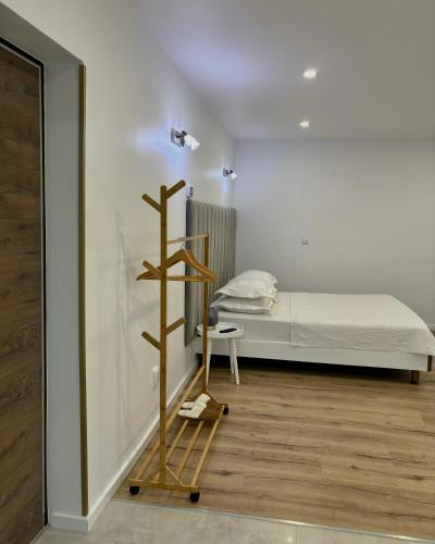 En eller flere senge i et værelse på Apartament Luna