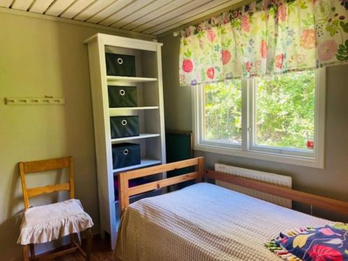 Postel nebo postele na pokoji v ubytování 6 person holiday home in STURKÖ-By Traum