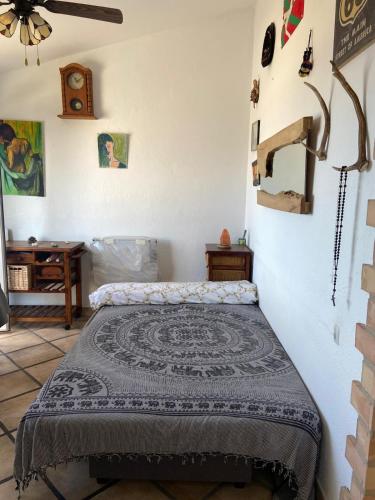 a bedroom with a bed in a room at Casa Tesoreta in Cala en Forcat
