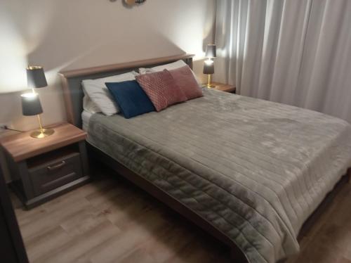 En eller flere senge i et værelse på Apartment Steven