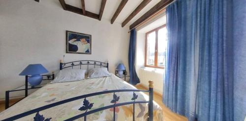 Postel nebo postele na pokoji v ubytování Chambres d'hôtes - Les Fayards