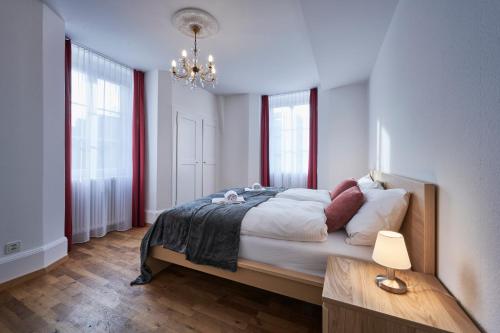 En eller flere senge i et værelse på Bern 5, City Apartment, central, modern, spacious