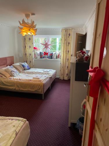 Postel nebo postele na pokoji v ubytování K&B Residence