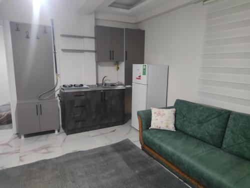 Η κουζίνα ή μικρή κουζίνα στο Umut apart otel