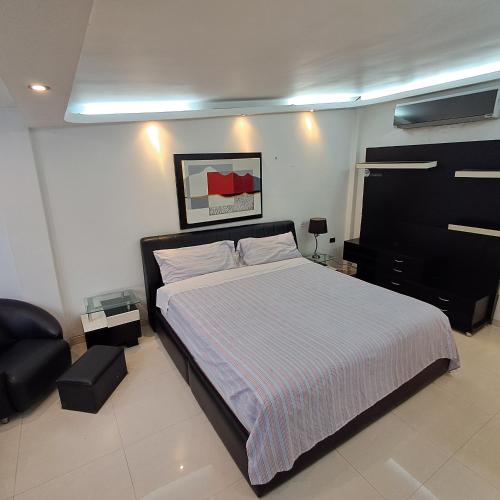 En eller flere senge i et værelse på Qta Costa Montaña