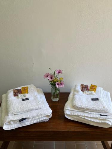 Un pat sau paturi într-o cameră la Hostal Andino