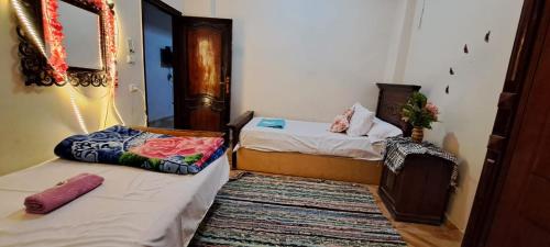 Letto o letti in una camera di Shali Castle Apartment