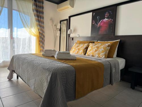 Ένα ή περισσότερα κρεβάτια σε δωμάτιο στο Cozy Studio in Cannes