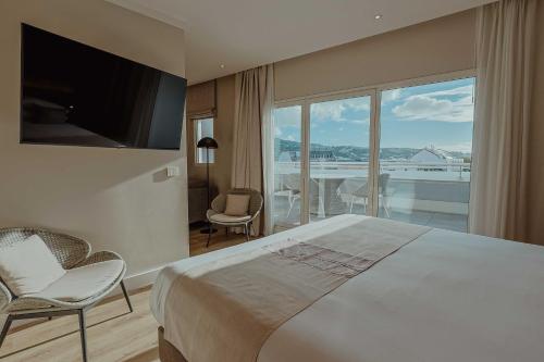 Postel nebo postele na pokoji v ubytování Hotel Reva TAHITI