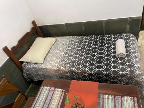 Ένα ή περισσότερα κρεβάτια σε δωμάτιο στο Espaço Riacho