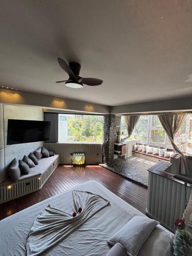 Кровать или кровати в номере Habitacion en Guatape Royal Garden Suite