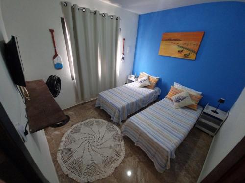 Postel nebo postele na pokoji v ubytování Vista para o Mar em Angra - 5 min do Centro