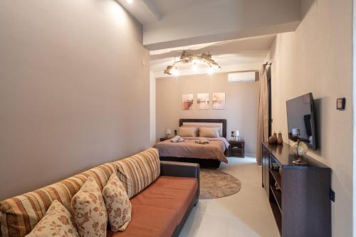 En eller flere senge i et værelse på LightHouse Portaria