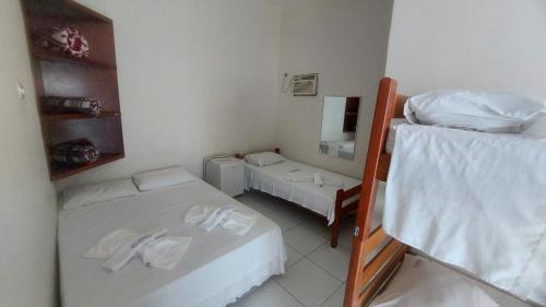 Postel nebo postele na pokoji v ubytování Pousada Iracema