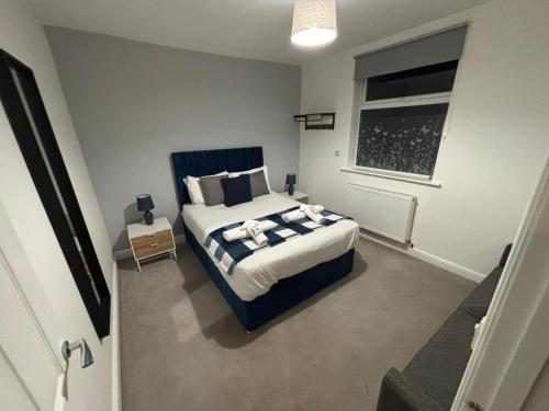 Postel nebo postele na pokoji v ubytování The Linden Leaf Rooms